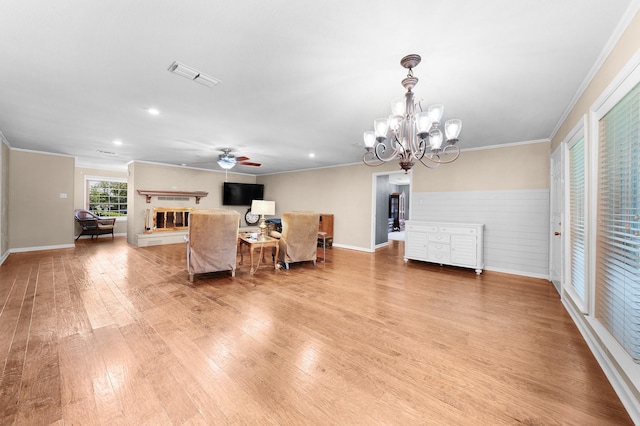 1440 Live Oak St, Sulphur Springs, TX 75482 - living area with a ceiling fan, ornamental molding, light wood-type flooring, recessed lighting, and a chandelier