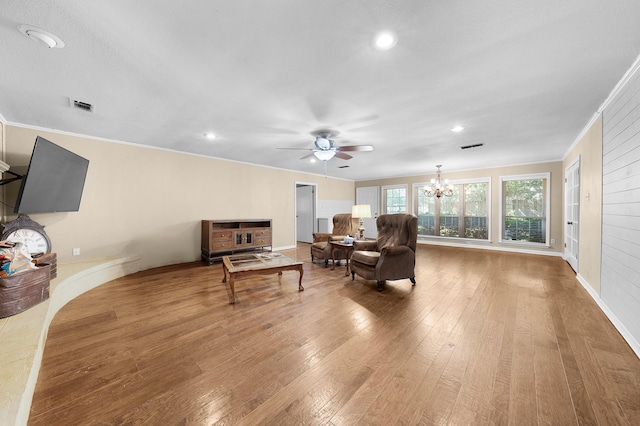 1440 Live Oak St, Sulphur Springs, TX 75482 - living area with crown molding, hardwood / wood-style flooring, a chandelier, ceiling fan, and recessed lighting