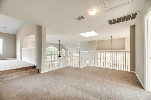 9204 Bottlebrush Ln, Irving, TX 75063 - carpeted empty room featuring vaulted ceiling