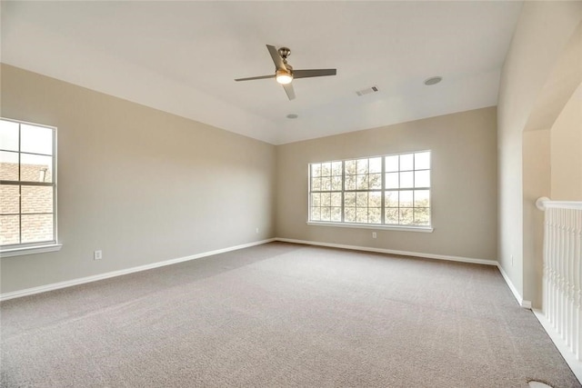 9204 Bottlebrush Ln, Irving, TX 75063 - empty room featuring healthy amount of natural light, ceiling fan, and carpet floors