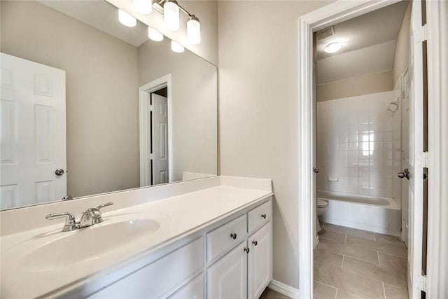 9204 Bottlebrush Ln, Irving, TX 75063 - bathroom featuring vanity, tile patterned flooring, and washtub / shower combination