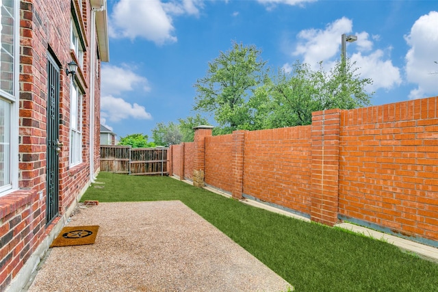 9204 Bottlebrush Ln, Irving, TX 75063 - fenced backyard with a patio