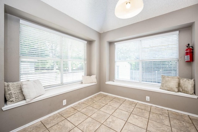 726 Texas Oak Trl, Lake Dallas, TX 75065 - spare room featuring light tile patterned floors and baseboards