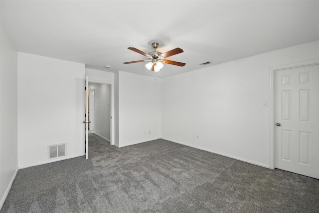 9846 Cedarcrest Dr, Providence Village, TX 76227 - unfurnished room featuring dark carpet and a ceiling fan
