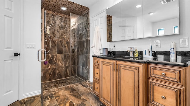 3705 Starlight Trl, Plano, TX 75023 - full bath featuring a shower stall, vanity, marble finish floors, and recessed lighting
