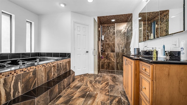 3705 Starlight Trl, Plano, TX 75023 - bathroom featuring a stall shower, vanity, a garden tub, marble finish flooring, and recessed lighting