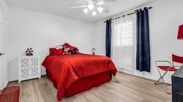 3705 Starlight Trl, Plano, TX 75023 - bedroom with wood finished floors and a ceiling fan