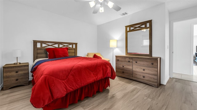 3705 Starlight Trl, Plano, TX 75023 - bedroom featuring wood finished floors, lofted ceiling, and ceiling fan