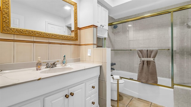 3705 Starlight Trl, Plano, TX 75023 - bathroom featuring vanity, bath / shower combo with glass door, and tile patterned flooring