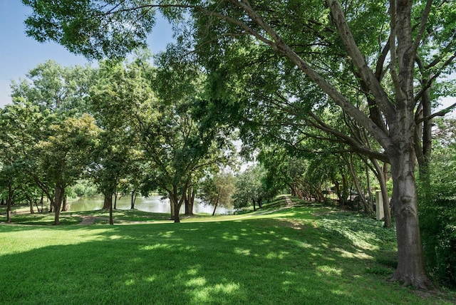 7955 Enclave Way, Dallas, TX 75218 - view of green lawn with a water view