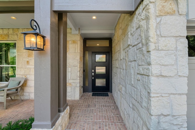 7955 Enclave Way, Dallas, TX 75218 - view of exterior entry featuring stone siding