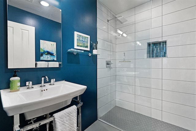 7955 Enclave Way, Dallas, TX 75218 - bathroom with tiled shower and a sink