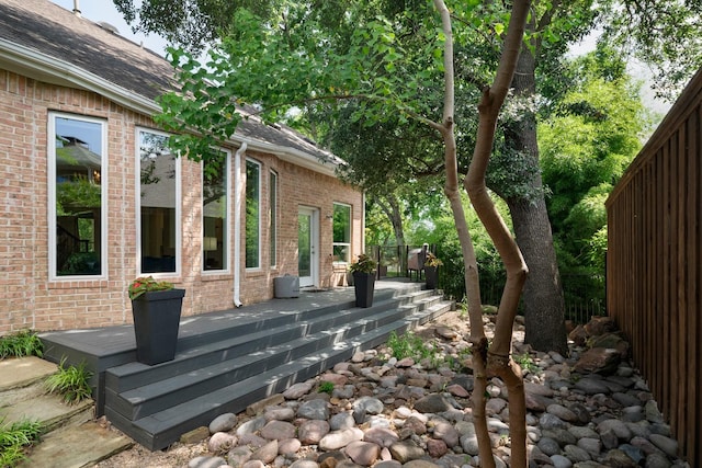 7955 Enclave Way, Dallas, TX 75218 - view of property exterior with brick siding and roof with shingles