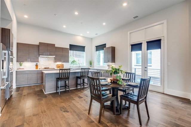 381 E Greenbriar Ln Unit 501, Dallas, TX 75203 - dining room with dark wood finished floors, recessed lighting, and french doors