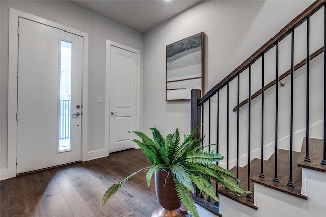 381 E Greenbriar Ln Unit 501, Dallas, TX 75203 - entryway featuring wood finished floors, healthy amount of natural light, and stairs
