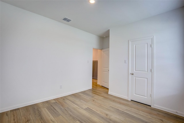 5221 Rockrose Ln, Princeton, TX 75407 - unfurnished bedroom featuring light wood finished floors and recessed lighting