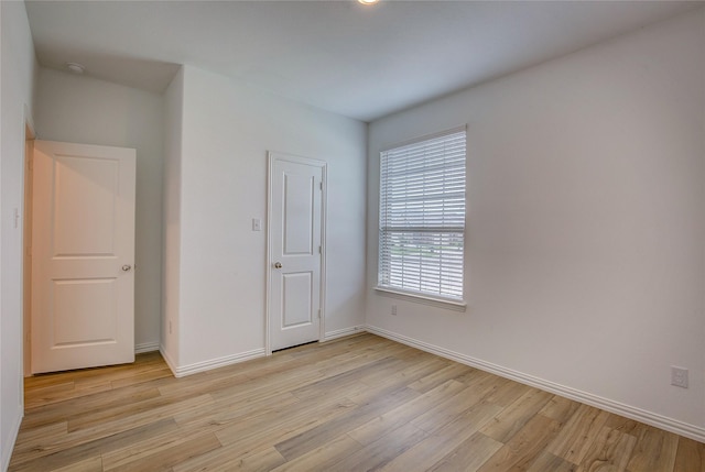 5221 Rockrose Ln, Princeton, TX 75407 - unfurnished bedroom featuring light wood-style floors and baseboards