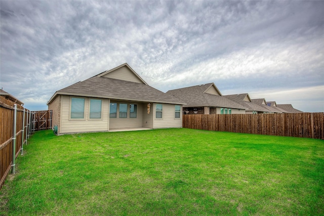 5221 Rockrose Ln, Princeton, TX 75407 - rear view of house with a fenced backyard