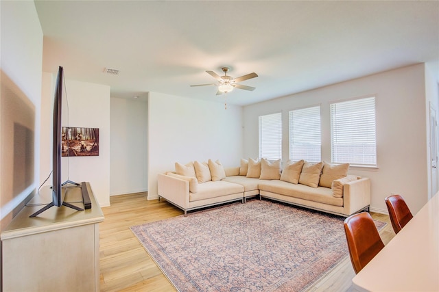 5221 Rockrose Ln, Princeton, TX 75407 - living area with light wood-style floors and ceiling fan