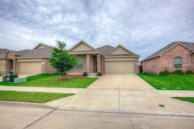 5221 Rockrose Ln, Princeton, TX 75407 - ranch-style home featuring brick siding, a garage, and a front yard