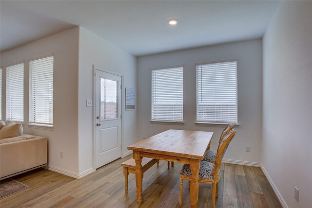 5221 Rockrose Ln, Princeton, TX 75407 - dining area with light wood finished floors and recessed lighting