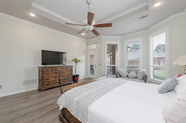 5729 Ridgehaven Dr, Plano, TX 75093 - bedroom featuring a tray ceiling, access to exterior, light wood finished floors, recessed lighting, and ornamental molding