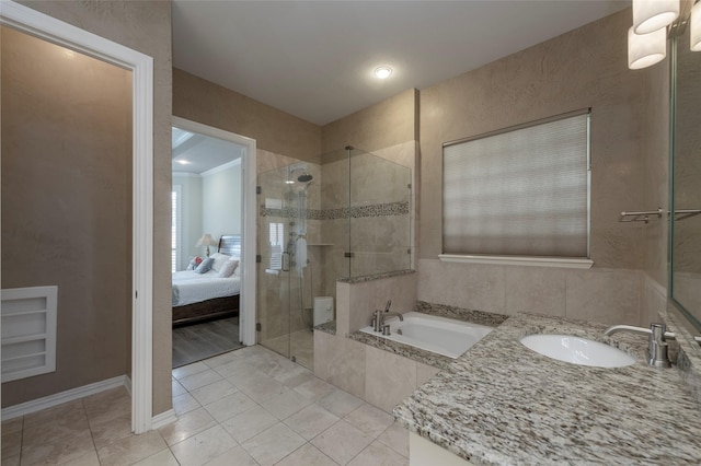 5729 Ridgehaven Dr, Plano, TX 75093 - ensuite bathroom with a bath, a tile shower, tile patterned floors, and vanity