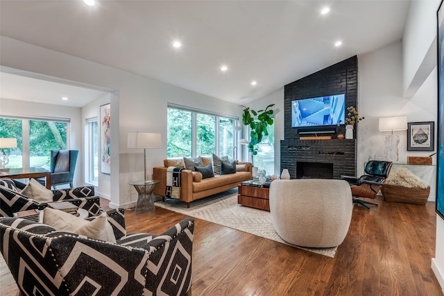 2811 Maple Springs Blvd, Dallas, TX 75235 - living area with wood finished floors, a fireplace, recessed lighting, and high vaulted ceiling