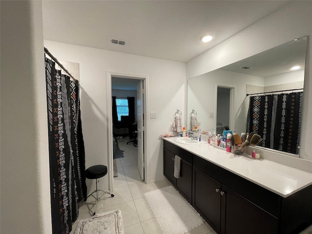 803 Odlozil Ln, Ennis, TX 75119 - full bath with vanity and tile patterned flooring