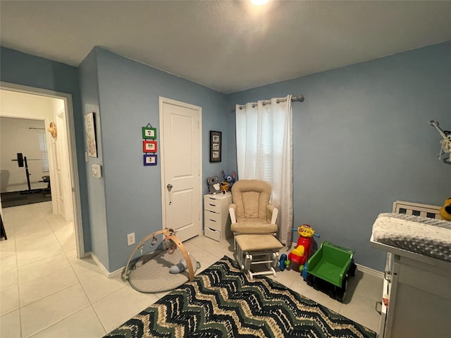 803 Odlozil Ln, Ennis, TX 75119 - bedroom featuring light tile patterned flooring and baseboards