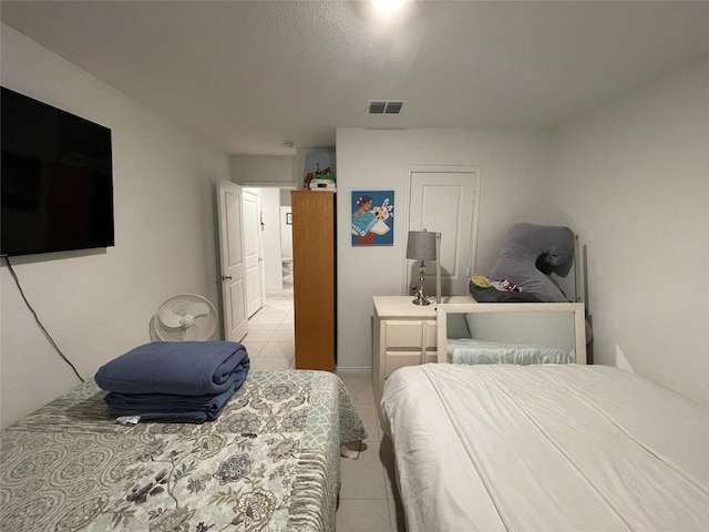 803 Odlozil Ln, Ennis, TX 75119 - bedroom with light tile patterned floors