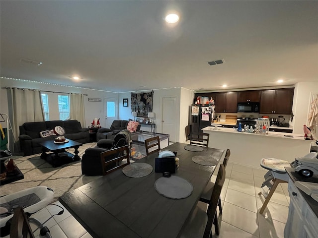 803 Odlozil Ln, Ennis, TX 75119 - dining room with light tile patterned floors and recessed lighting