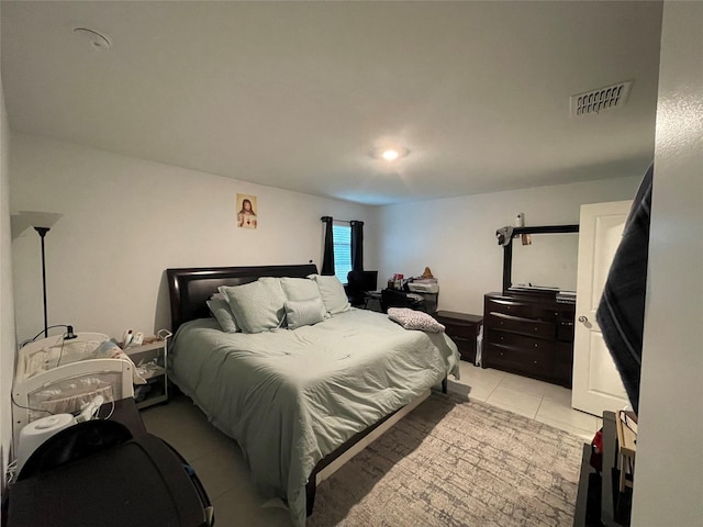 803 Odlozil Ln, Ennis, TX 75119 - bedroom with light tile patterned flooring
