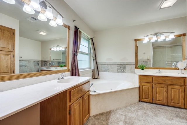 15 Cumberland Cir, Denison, TX 75021 - full bath with a stall shower, a garden tub, and two vanities