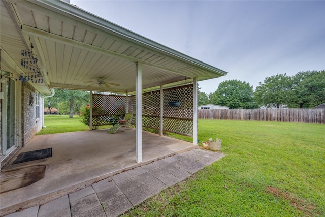 15 Cumberland Cir, Denison, TX 75021 - fenced backyard featuring a ceiling fan and a patio