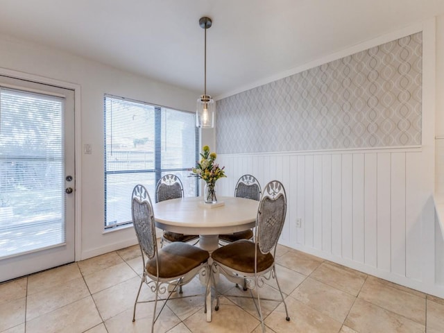 2614 San Saba St, Mesquite, TX 75150 - dining room with wainscoting and light tile patterned flooring