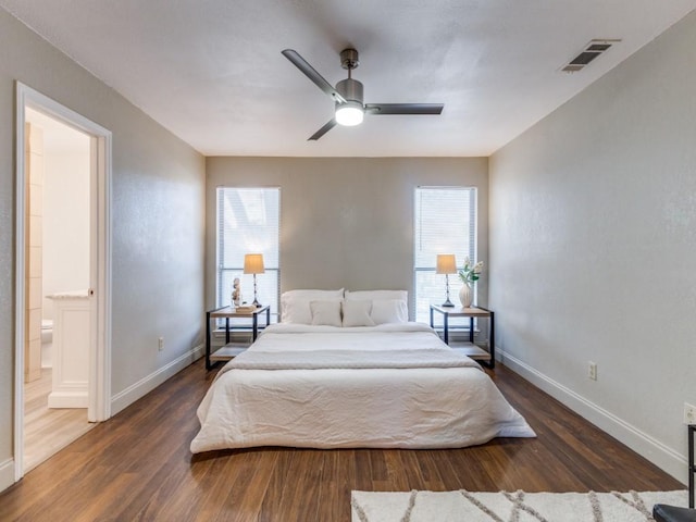 2614 San Saba St, Mesquite, TX 75150 - bedroom with wood finished floors, connected bathroom, and ceiling fan