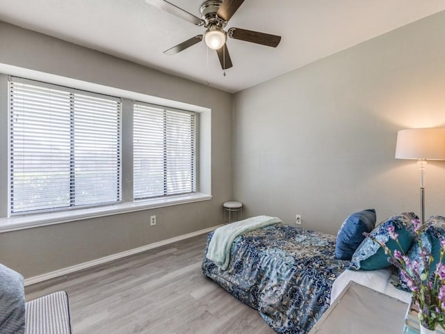 2614 San Saba St, Mesquite, TX 75150 - bedroom featuring wood finished floors and ceiling fan