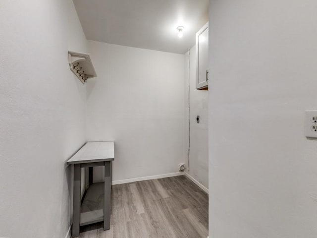 2614 San Saba St, Mesquite, TX 75150 - washroom with light wood-style floors and baseboards