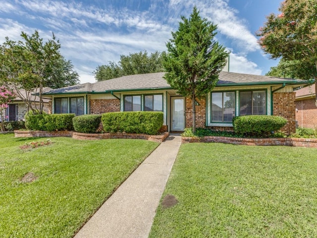 2614 San Saba St, Mesquite, TX 75150 - ranch-style home with brick siding and a front lawn