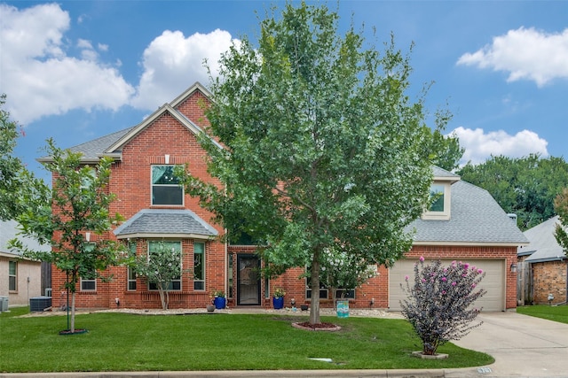 6707 Canyon Crest Dr, Fort Worth, TX 76132 - view of front of property with driveway, a garage, a front lawn, and a shingled roof