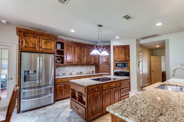 6707 Canyon Crest Dr, Fort Worth, TX 76132 - kitchen with stainless steel appliances, open shelves, backsplash, a center island, and light stone counters