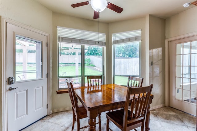 6707 Canyon Crest Dr, Fort Worth, TX 76132 - dining area featuring healthy amount of natural light, a ceiling fan, and light tile patterned floors
