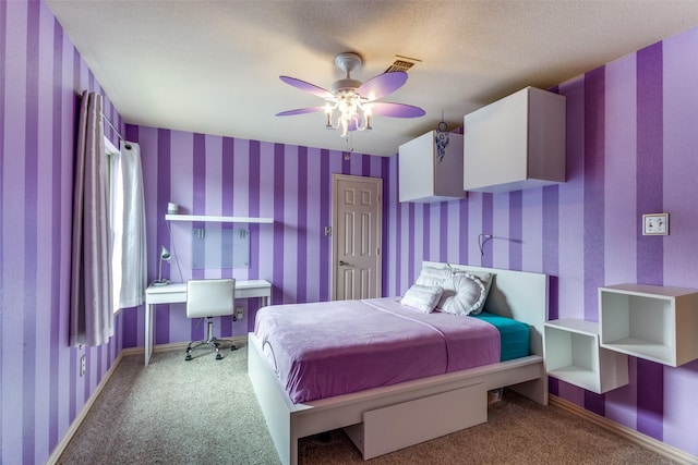 6707 Canyon Crest Dr, Fort Worth, TX 76132 - bedroom featuring carpet flooring, an office area, a ceiling fan, and wallpapered walls
