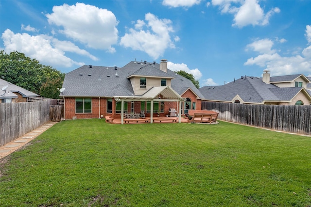 6707 Canyon Crest Dr, Fort Worth, TX 76132 - back of house featuring a hot tub, brick siding, a fenced backyard, and a patio