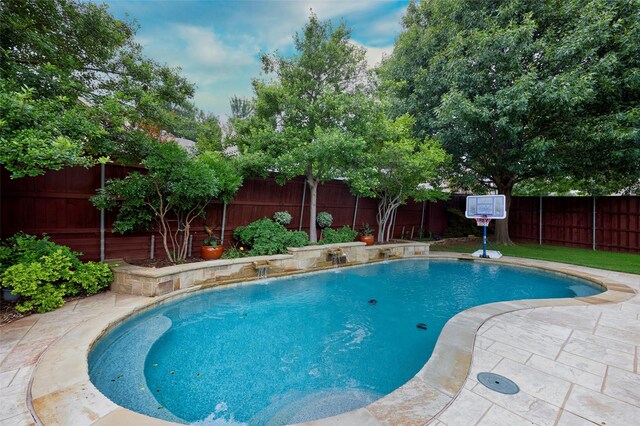 5513 Hill Haven Ct, Frisco, TX 75035 - view of pool with a fenced backyard