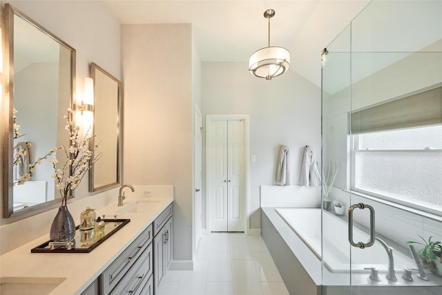 5513 Hill Haven Ct, Frisco, TX 75035 - full bath with a bath, double vanity, tile patterned floors, and vaulted ceiling