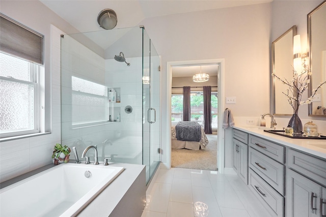 5513 Hill Haven Ct, Frisco, TX 75035 - bathroom with a shower stall, a garden tub, double vanity, tile patterned flooring, and connected bathroom