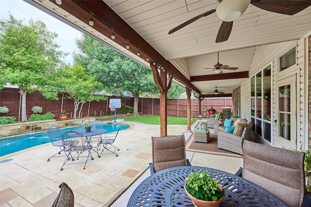 5513 Hill Haven Ct, Frisco, TX 75035 - fenced backyard with outdoor dining area, ceiling fan, and a patio area