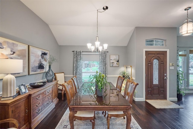 5513 Hill Haven Ct, Frisco, TX 75035 - dining room featuring a chandelier, dark wood-type flooring, and lofted ceiling